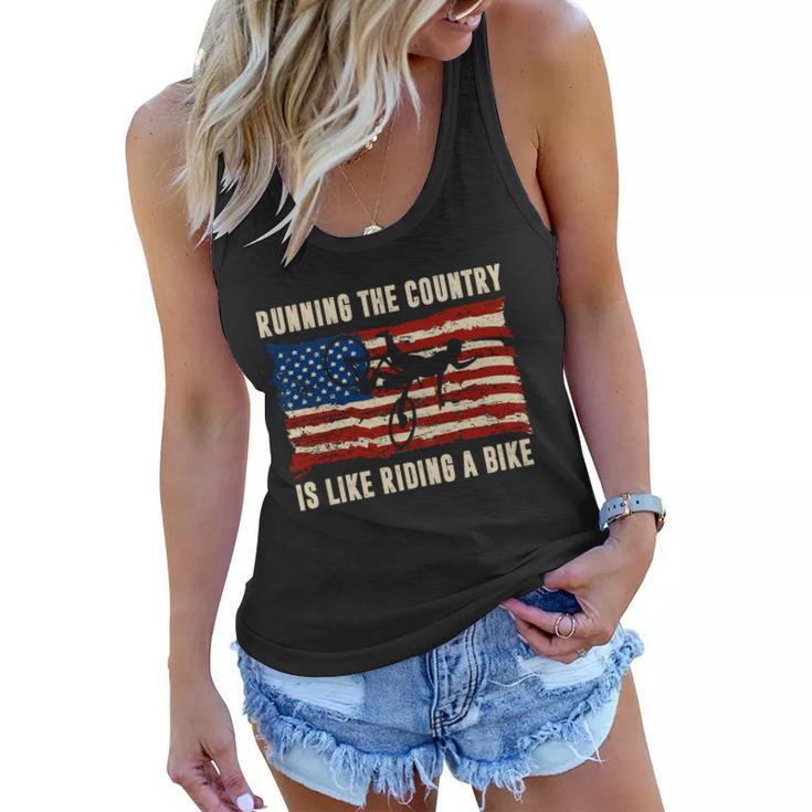 Running The Country Is Like Riding A Bike Women Flowy Tank