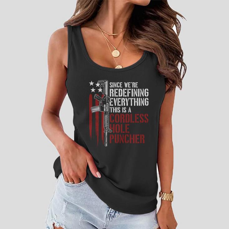 Were Redefining Everything This Is A Cordless Hole Puncher Tshirt Women Flowy Tank