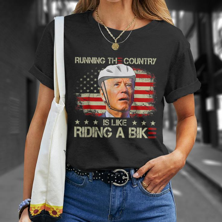 Joe Biden Falling Off Bike Running The Country Is Like Riding A Bike V2 Unisex T-Shirt Gifts for Her