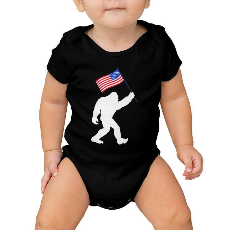 Bigfoot With American Flag Funny 4Th Of July Meaningful Gift Baby Onesie