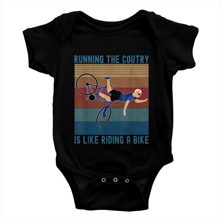 Funny Biden Falls Off Bike Running The Country Like Riding A Bike V3 Baby Onesie