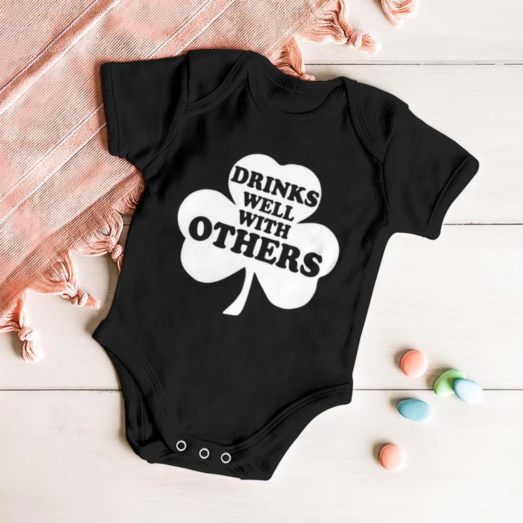 Drinks Well With Others Funny St Patricks Day Drinking Tshirt Baby Onesie