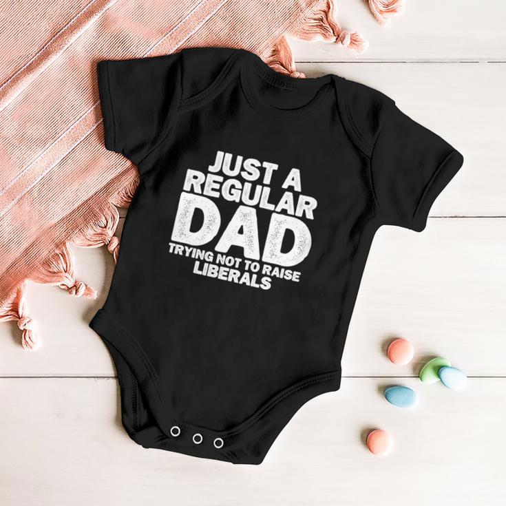 Just A Regular Dad Trying Not To Raise Liberals Tshirt Baby Onesie