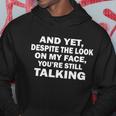 And Yet Despite The Look On My Face Youre Still Talking Hoodie Unique Gifts