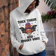 Thick Thights And Spooky Vibes Halloween Messy Bun Hair Youth Hoodie