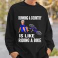 Biden Falls Off Bike Joe Biden Falling Off His Bicycle Funny Meme Sweatshirt Gifts for Him