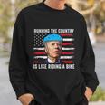 Joe Biden Falling Off His Bicycle Funny Biden Falls Off Bike America Flag Sweatshirt Gifts for Him