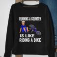 Biden Falls Off Bike Joe Biden Falling Off His Bicycle Funny Meme Sweatshirt Gifts for Old Women