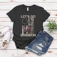 Gun American Flag Patriots Lets Go Brandon On Back Women T-shirt Personalized Gifts