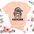 Air Force Mom Messy Bun Sunglasses Military Mom Mothers Day Women's Short Sleeve T-shirt Unisex Crewneck Soft Tee Heather Peach