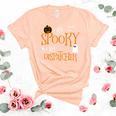 One Spooky 911 Dispatcher Halloween Funny Costume Women's Short Sleeve T-shirt Unisex Crewneck Soft Tee Heather Peach