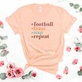 Thanksgiving Football Turkey Nap Repeat Women's Short Sleeve T-shirt Unisex Crewneck Soft Tee Heather Peach