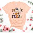 Trick Or Teach Funny Teacher Halloween Costume Women's Short Sleeve T-shirt Unisex Crewneck Soft Tee Heather Peach