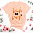 Trick Or Teach Teacher Halloween Design Unisex Crewneck Soft Tee Heather Peach