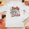 Retro Christmas Holly Jolly Babe Smiley Face Vintage Christmas Women Graphic Long Sleeve T-shirt Funny Gifts